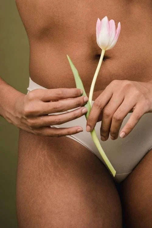 woman's thighs with stretch marks